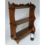 A 3 tier open mahogany bookcase CONDITION: Please Note - we do not make reference