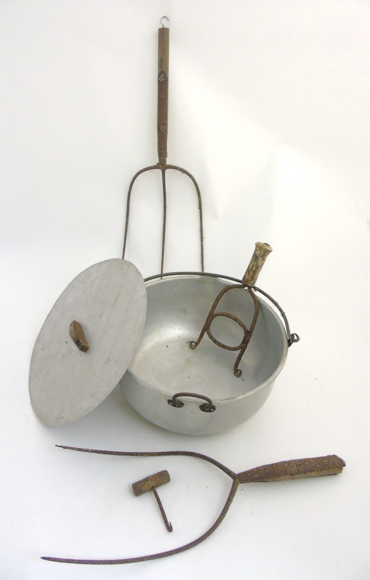 Vintage Agricultural tools : A creamer with lid , wrought iron stirrer , bale / wad hook ,