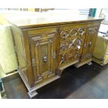 Small oak sideboard with Jacobean-style carving CONDITION: Please Note - we do not
