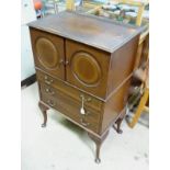 An inlaid music cabinet CONDITION: Please Note - we do not make reference to the