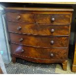 A Victorian mahogany bow fronted chest of drawers comprising 2 short over 3 graduated long drawers.