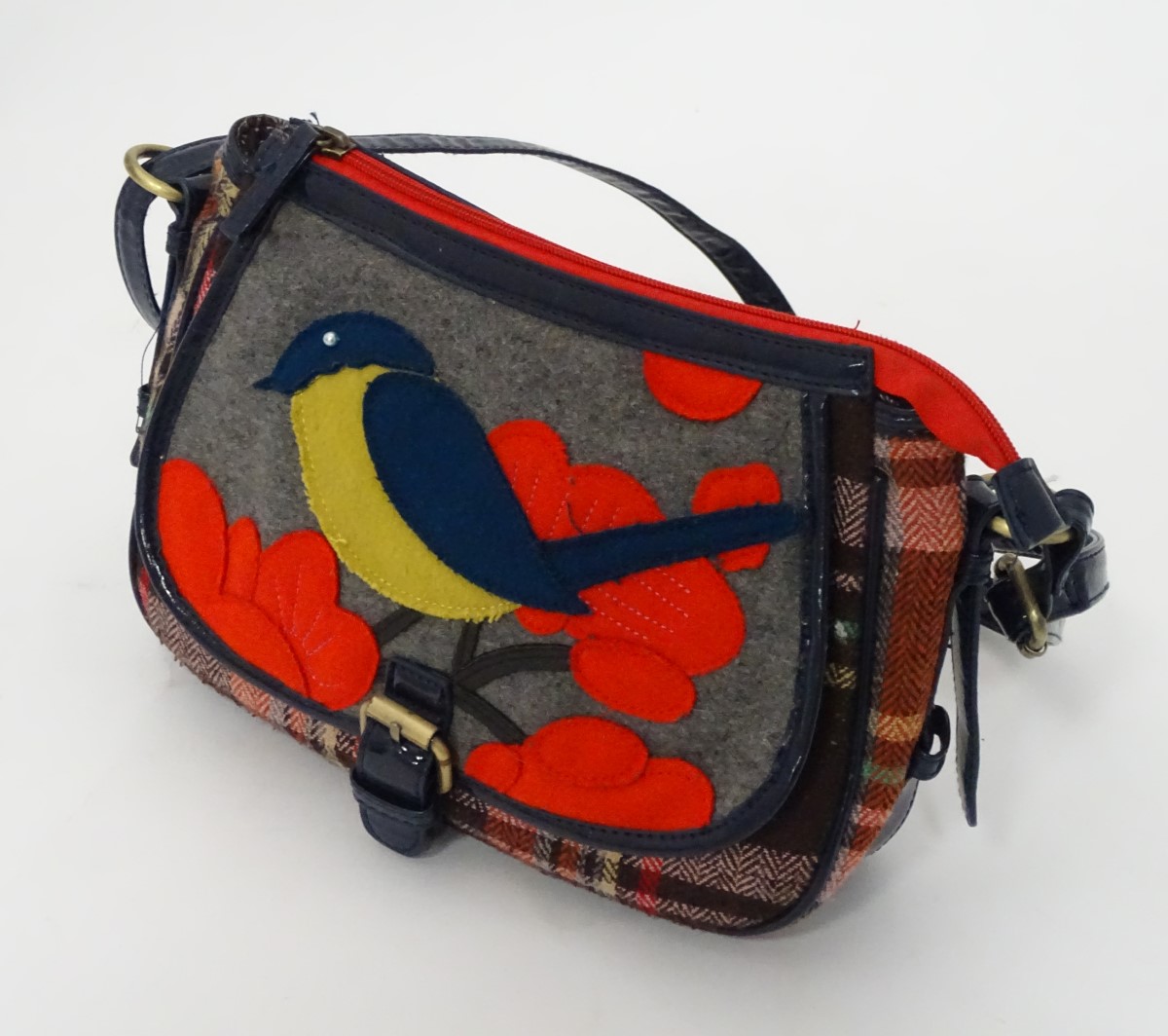 A handbag with bird decoration together with costume jewellery contents CONDITION: - Image 3 of 3