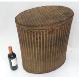 A Lloyd loom style washing basket CONDITION: Please Note - we do not make
