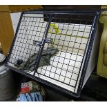 A travelling dog crate CONDITION: Please Note - we do not make reference to the