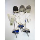 A quantity of fencing equipment to include clothing, masks and foils by ' Uhlmann Fencing etc.