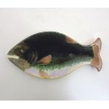 A 19th Century Majolica dish in the shape of a fish.