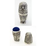 Sewing / needlework, a white metal sewing companion formed as an owl, the base a pin cushion,