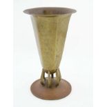 Arts and Crafts: a brass hammered hexagonal pedestal vase,