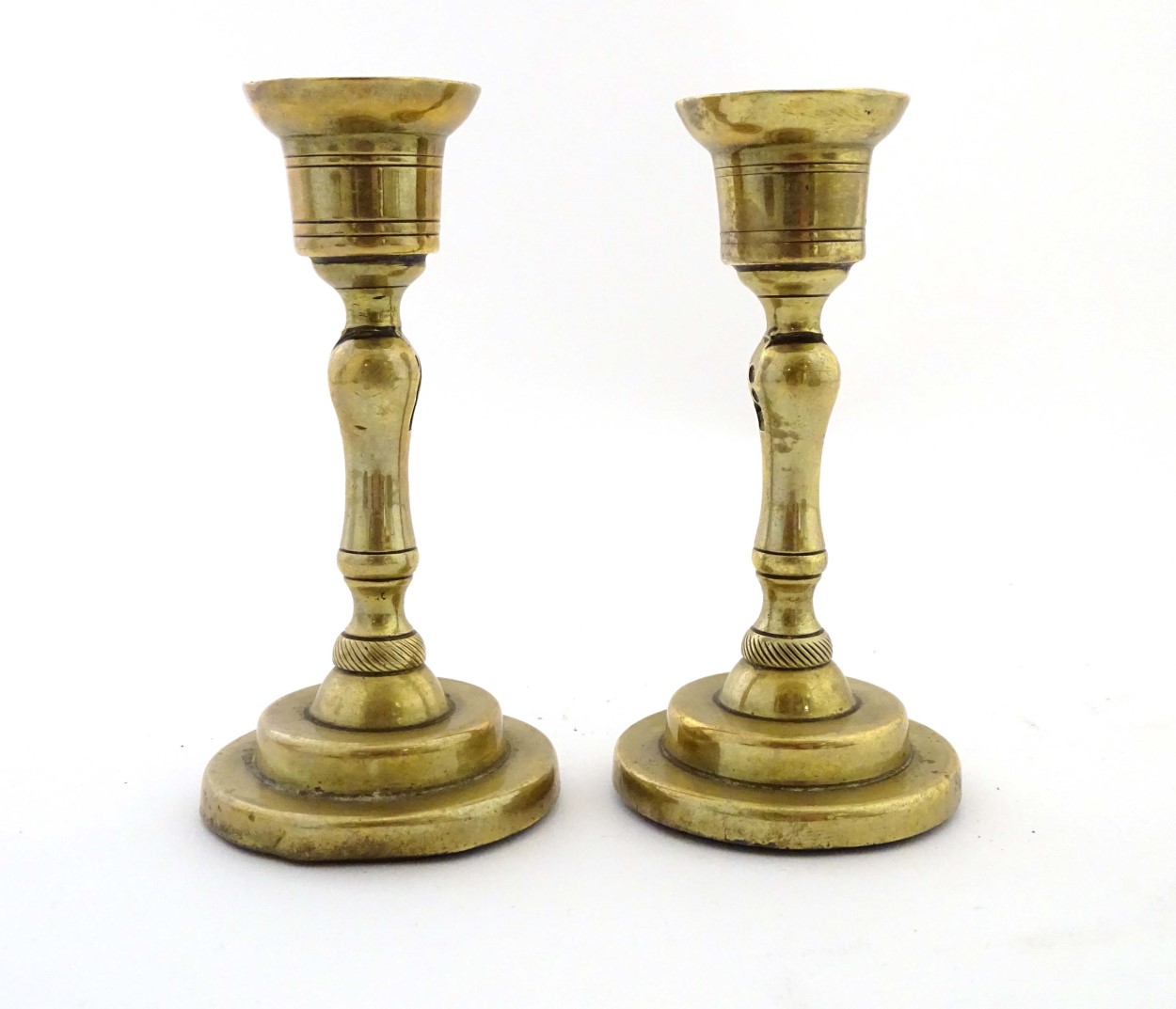 An unusual pair of brass candlesticks, having adjustable/angled sconces, marked 'The New London T.R. - Image 4 of 16