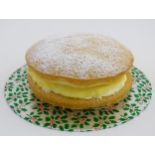 Victoria sponge with a jam and butter cream filling with a festive dusting of icing sugar Kindly