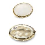Memorial jewellery: A 19thC large brooch set with large chalcedony oval cabochon within a yellow