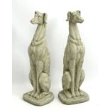 Garden Statuary: A pair of reconstituted stone statues of seated dogs.