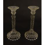 A pair of moulded glass candlesticks, approx.