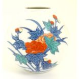 Oriental vase with floral decoration. Oriental mark to base.