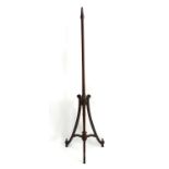 A late 19thC rosewood hat stand with turned tapering stem raised on a tripod base with applied