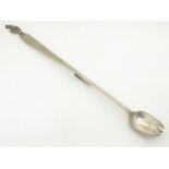 A silver plate advertising pickle / chutney spoon,