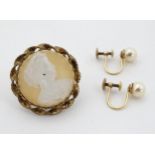 A pair of 9ct gold pearl stud earrings together with a gilt metal cameo brooch