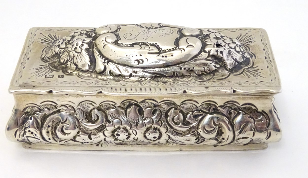 A silver dressing table box with hinge lid and embossed decoration. - Image 3 of 6