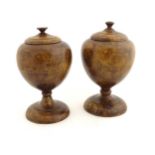 Treen: A pair of turned walnut pedestal pots and covers CONDITION: Please Note - we