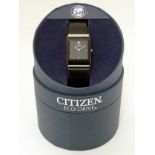 Citizen : an Eco-drive gentleman's quartz dress watch of squared form with black ion-plated leather