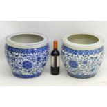 A pair of Chinese blue and white ceramic planters,