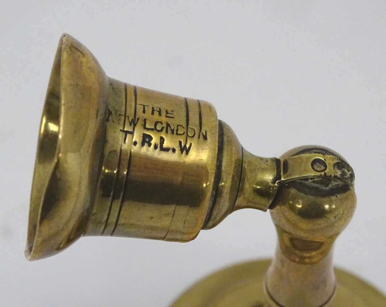 An unusual pair of brass candlesticks, having adjustable/angled sconces, marked 'The New London T.R. - Image 13 of 16