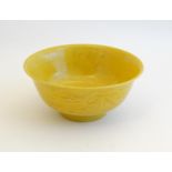 A Chinese Imperial yellow glazed, incised dragon bowl , decorated with 5 clawed dragon and phoenix ,