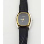Longines: a gentleman's mechanical dress watch, a black dial with gilt hands,