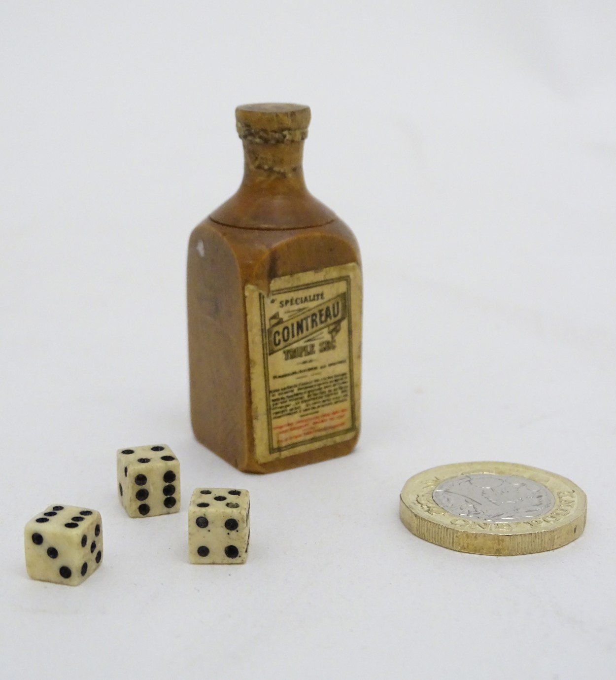 Cointreau Triple Sec - A novelty carved miniature boxwood bottle shaped container unscrewing to - Image 10 of 11