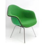 Vintage Retro : a Charles and Ray Eames designed fibreglass armchair ,