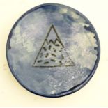 Minty Mountain: A local studio pottery small blue glazed dish decorated with a stylised mountain.