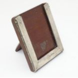 A silver photograph frame / date card holder hallmarked Chester 1910 maker RG 3 1/2" high overall