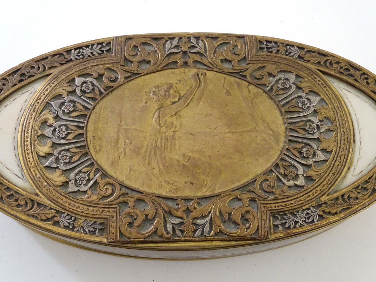 Art Nouveau : An oval gilded bronze and silver plate box having an image of a maiden picking fruit - Image 10 of 12