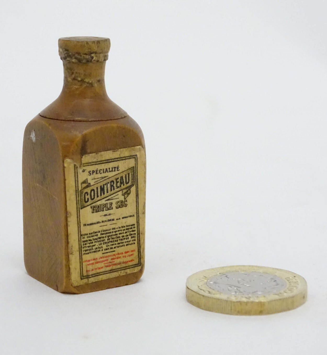 Cointreau Triple Sec - A novelty carved miniature boxwood bottle shaped container unscrewing to - Image 8 of 11