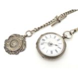 A silver cased fob watch,
