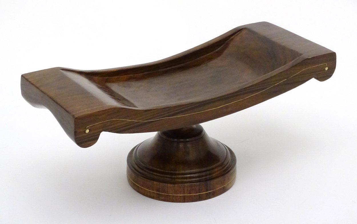 A mahogany pedestal cheese coaster / stand.