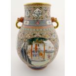 A large Chinese famille rose 'Niutou Zuo' twin handled vase,