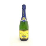 A bottle of Monopole Heidsieck & Co Blue Top Champagne Kindly donated by Mr K Gostelow All