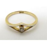 An 18ct gold ring set with diamond solitaire CONDITION: Please Note - we do not