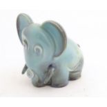 A Beswick figure of an pale blue elephant, model no. 569, approx. 4 3/4" high.