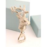 A Culinary Concepts bottle opener in the form of a stag head, with original box, approx. 5" high.