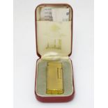 Dunhill: A cased, collectable gold-plated '70' US RE24163 lighter,