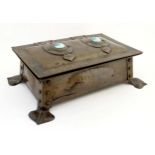 Arts and Crafts : A copper table casket with Ruskin style ceramic cabochon to lid,