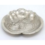 Art Nouveau : a silverplate dish with cast and embossed decoration.