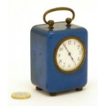 Early XX bedside Alarm clock : a blue early plastic cased clock with integral winder ,