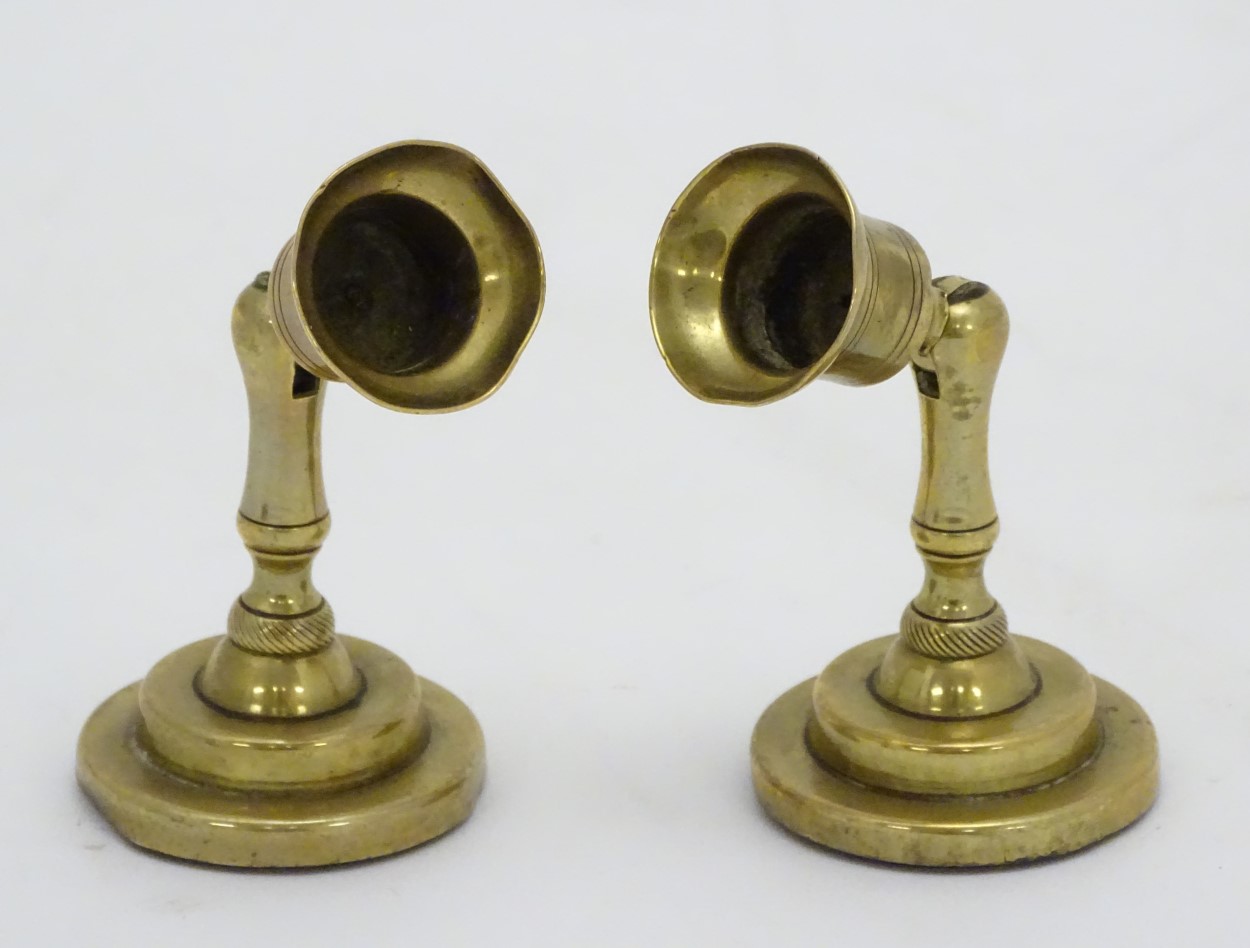 An unusual pair of brass candlesticks, having adjustable/angled sconces, marked 'The New London T.R. - Image 10 of 16