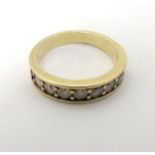 A gold half eternity ring set with band of 8 diamonds CONDITION: Please Note - we