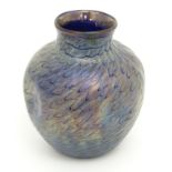 An Art Nouveau Loetz style glass vase / pot with iridescent blue decoration.