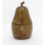 A late 20thC-early 21stC pear wood tea caddy formed as a pear.