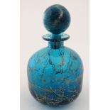 An Art glass scent bottle and stopper in the manner of Mdina Glass.